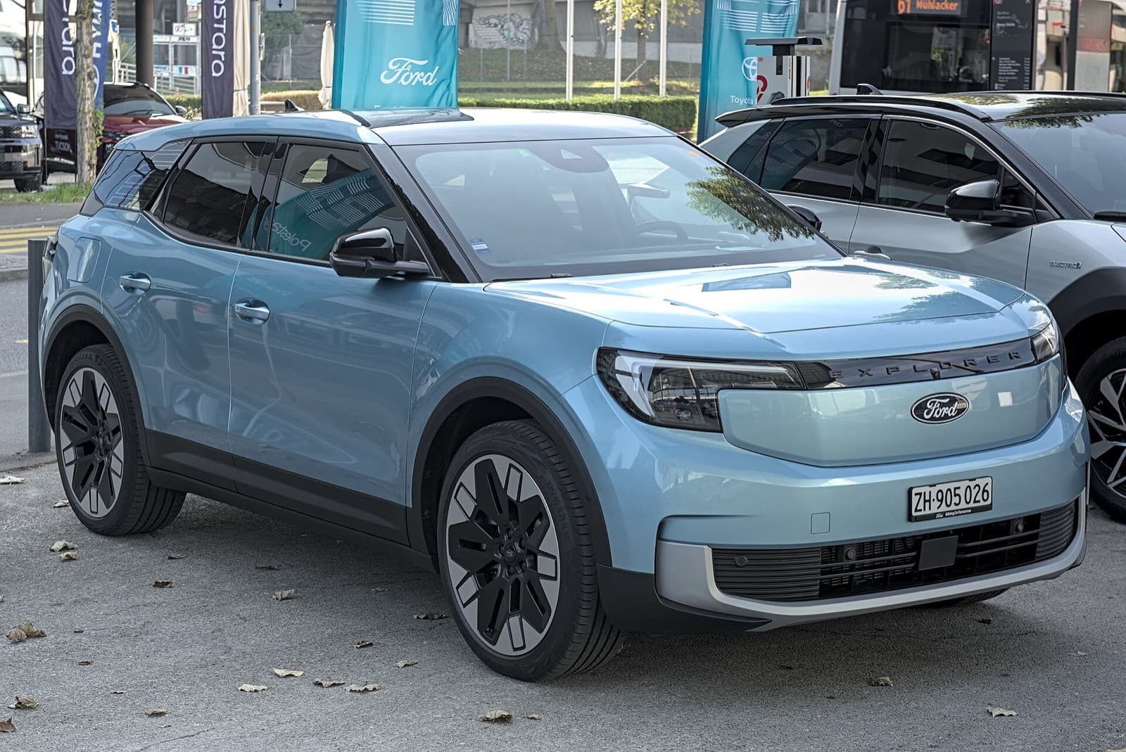 A light blue Ford Explorer EV compact electric crossover parked outdoors